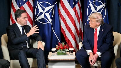 US President Donald Trump and Nato Secretary General Mark Rutte in Davos. AFP