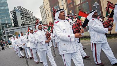 Best foot forward: the Military Marching Band of Abu Dhabi plays at Potsdamer Platz in Berlin, Germany. The band was in the German capital for the Berlin Military Tattoo and was giving a spontaneous concert in the city centre. Felix Zahn / EPA
