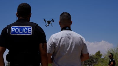 British police officers pilot a drone with cameras at a UK military base between the Greek Cypriot south and the Turkish Cypriot north. AP