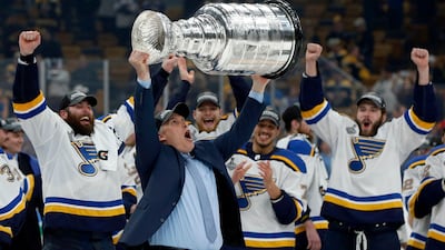 St. Louis Blues head coach Craig Berube carries the Stanley Cup after the Blues defeated the Boston Bruins in Game 7 of the NHL Stanley Cup Final in Boston. AP Photo