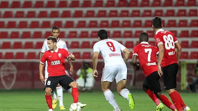 Al Ahli will be looking to new midfielder Everton Ribeiro, left, to help them bounce back from last week's stunning 4-0 home defeat to Al Wasl. Satish Kumar / The National