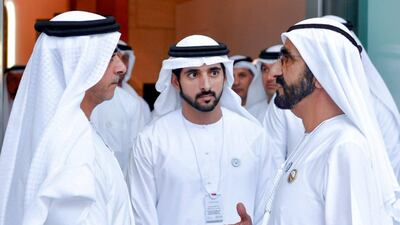 Sheikh Mohammed Bin Rashid speaks with Sheikh Saif bin Zayed, Deputy Prime Minister and Minister of Interior, and Sheikh Hamdan bin Mohammed, Crown Prince of Dubai, while attending the Arab Strategy Forum. Dubai Media Office