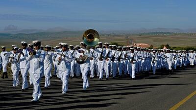 South African armed forces parade as they follow the funeral procession carrying the coffin of former South African President Nelson Mandela. Carl de Souza / AFP Photo