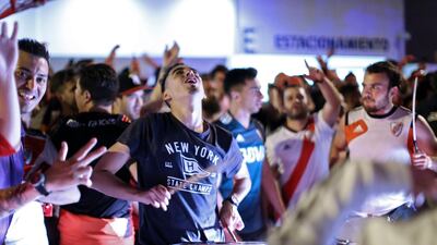 Supporters of Argentina's River Plate wait for their team in Lima. AFP