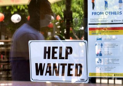 A 'Help Wanted' sign is posted at a restaurant in Los Angeles, California. AFP