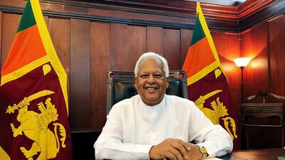 Sarath Amunugama was appointed foreign minister in a new Sri Lanka government that still awaits parliament's endorsement.