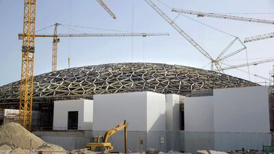 The Louvre Abu Dhabi, located on Saadiyat Island, is due to open in 2015. Construction is continuing at pace with the domed roof now visible. Silvia Razgova / The National
