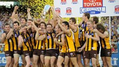 Hawthorn players celebrate winning the 2008 grand final following victory over Geelong at the MCG.