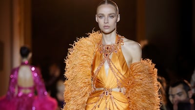 A gown in sunset orange at Zuhair Murad. Getty Images