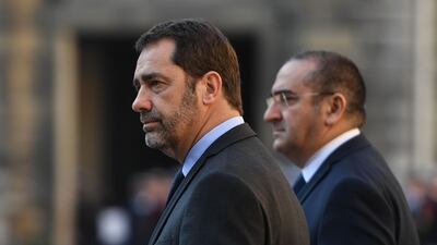 French Interior Minister Christophe Castaner (L) in Paris, on March 21, 2019. AFP