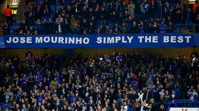 Chelsea fans show their support for their manager during the Champions League match on Wednesday night against Dynamo Kiev at Stamford Bridge. Clive Rose / Getty Images