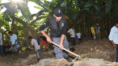 A volunteer from Dubai Cares digs foundations for the primary school in Barkamuda, Nepal, which will cater for 150 pupils. The project is part of the group’s Volunteer Globally 2014. Courtesy Dubai Cares