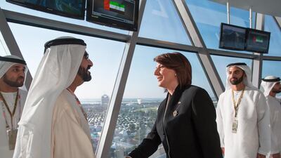 Sheikh Mohammed bin Rashid, Vice President and Ruler of Dubai, left, greets Atifete Jahjaga, the president of Kosovo, second right, during the final day of the 2014 Formula 1 Etihad Airways Abu Dhabi Grand Prix at Yas Marina Circuit. Seen with Sheikh Mohammed bin Saud bin Saqr Al Qasimi, Crown Prince and Deputy Ruler of Ras Al Khaimah, back right. Mohamed Al Hammadi / Crown Prince Court — Abu Dhabi