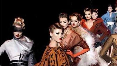 Chalhoub Group has joint ventures with prestige names such as Christian Dior. Above, models wear the brand's spring-summer collection. AFP