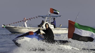 A woman on jet ski at a boat parade in Fujairah. Jaime Puebla / The National