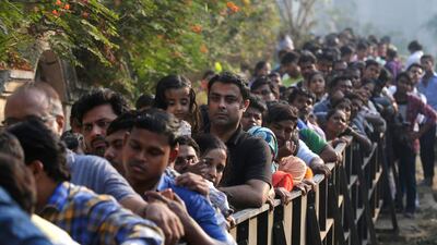 Mourners line the streets of Mumbai. Rafiq Maqbool / AP Photo