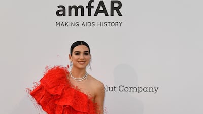 Dua Lipa in a 'go big or go home' Maison Valentino gown. Photo: AFP