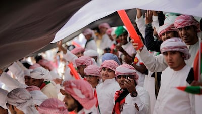 UAE fans celebrate as the UAE Olympic team plays Australia for a Olympic qualifier game in Abu Dhabi. Sammy Dallal / The National
