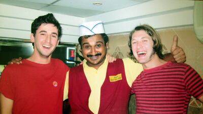 From left: Alex Ritman, his favorite waiter and friend Andy Tillett at Baithal Ravi in 2009. Courtesy Alex Ritman