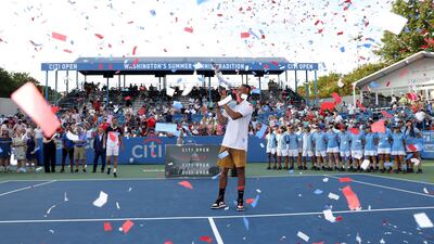 Nick Kyrgios holds up the trophy after defeating Daniil Medvedev of Russia during the men's singles final of the Citi Open at Rock Creek Tennis Center on August 04, 2019 in Washington. Getty