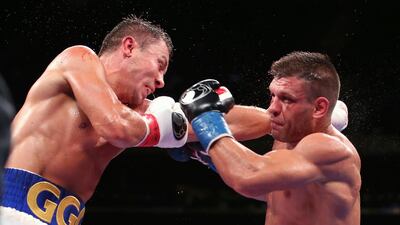 Gennadiy Golovkin, left, is hit by Sergiy Derevyanchenko during the seventh round of an IBF middleweight championship title bout at Madison Square Garden. AP Photo