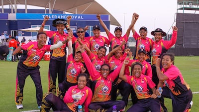 Papua New Guinea players celebrate after beating the UAE by 29 runs.
