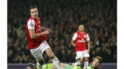 A reader objects to criticism of Arsenal striker Robin van Persie and his play against Newcastle United. Ian Kington / AFP