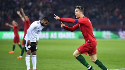 Portugal's forward Cristiano Ronaldo, right, celebrates after scoring a goal during their international friendly against Egypt in Zurich. Fabrice Coffrini / AFP