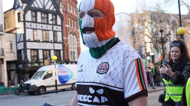 Kneecap's JJ O'Dochartaigh, also known as DJ Provai, arrives at the Royal Courts of Justice in London. PA
