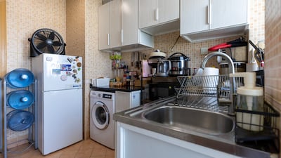 The kitchen, which has a balcony attached