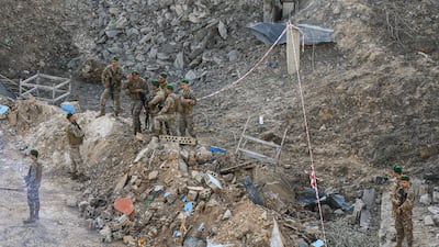 Lebanese soldiers inspect the scene of an Israeli air strike on a building near the southern Lebanese village of Kfar Dounine, in Bint Jbeil district. AFP