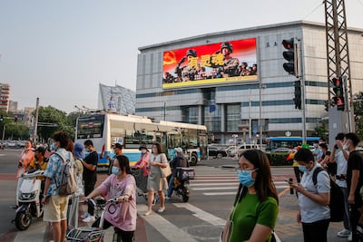 A billboard in Beijing marks the 95th anniversary of the founding of the People's Liberation Army (PLA). EPA