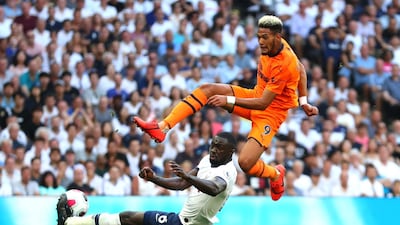 Joelinton is challenged by SPurs' Davinson Sanchez at the Tottenham Hotspur Stadium. Getty
