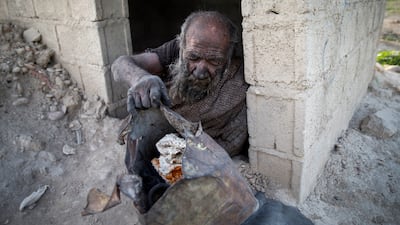 Amou Haji, who lived in a brick shack built by concerned neighbours, finally gave in to the pressure and washed a few weeks ago.