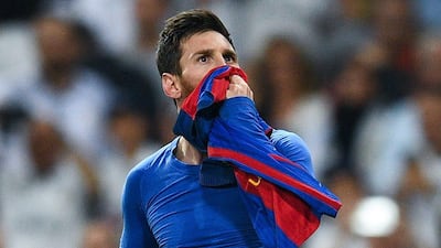 Barcelona's Lionel Messi celebrates his winning goal against Real Madrid at the Santiago Bernabeu stadium on April 23, 2017 in Madrid, Spain. David Ramos / Getty Images