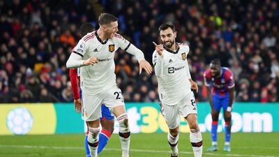 Fernandes and Weghorst celebrate the goal. Getty