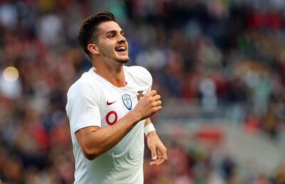 Portugal's Andre Silva celebrates after scoring the opening goal during a friendly between Portugal and Tunisia in Braga, Portugal on May 28, 2018. Armando Franca / AP Photo