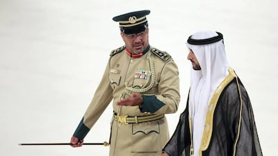 Sheikh Hamdan bin Mohammed, Crown Prince of Dubai, speaks to Ghaith Al Suwaidi, Director of Dubai Police Academy at the 27th graduation ceremony.