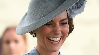 Catherine, Duchess of Cambridge accessorised with a Philip Treacy hat. Getty Images