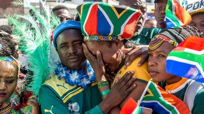 South African rugby fans react with disappointment after it was announced that France will host the 2023 Rugby World Cup during a public screening in Pretoria. Christiaan Kotze / EPA