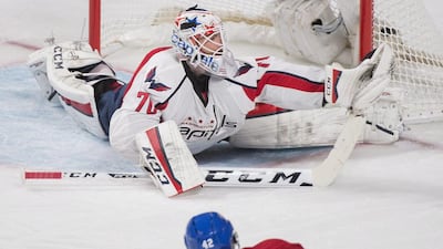 Braden Holtby, the Capitals goaltender, makes a save against the Canadiens’ Sven Andrighetto on Thursday. Graham Hughes / AP Photo