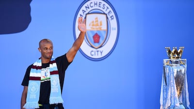 Vincent Kompany of Manchester City acknowledges fans during the Manchester City Teams Celebration Parade in Manchester, England. Getty Images