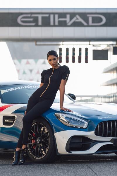 Model Chanel Iman wearing the Etihad Grid Girl uniform designed by Prabal Gurung