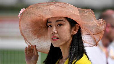 The bigger the better when it comes to race day hats. AP