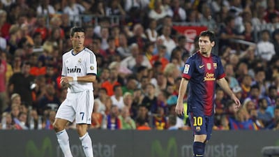 FC Barcelona's Lionel Messi and Real Madrid's Cristiano Ronaldo remain the top draw in Primer Liga. Andres Kudacki / AP Photo