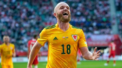 Wales' midfielder Jonathan Williams celebrates scoring the opening goal. AFP