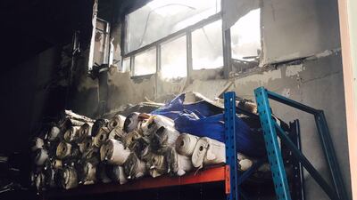 A fire damaged a warehouse in Ajman. Courtesy Ajman Civil Defence