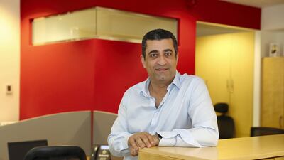 Ayman Badawi, co-founder and chief executive of Duba-based 1clique, says not raising venture funding has been a blessing-in-disguise for his HR software firm. Pawan Singh / The National