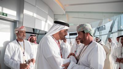 Sheikh Mohamed bin Zayed greets Sayyid Khalid Bin Hilal Al Busaidi, Minister of Diwan of Royal Court of Oman (R), in Shams Tower on the final day of the 2016 Formula 1 Etihad Airways Abu Dhabi Grand Prix. Seen with Sayyid Haitham bin Tariq al Said, Minister of Heritage & Culture of Oman (back L). Mohammed Al Hammadi / Crown Prince Court - Abu Dhabi