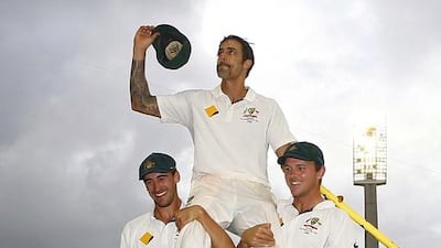 Mitchell Johnson, centre, finished his Test career as Australia's fourth-most successful bowler of all time. David Gray / Reuters